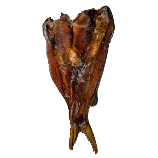Poisson machoiron fumé, séché et fumé artisanalement, offrant une saveur riche pour recettes de fruits de mer ou grillades exotiques.