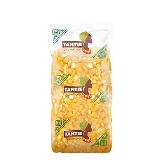 Maïs dégermé jaune TANTIE en sachet transparent, idéal pour soupes et plats mijotés, avec texture agréable et usage polyvalent en épicerie salée.