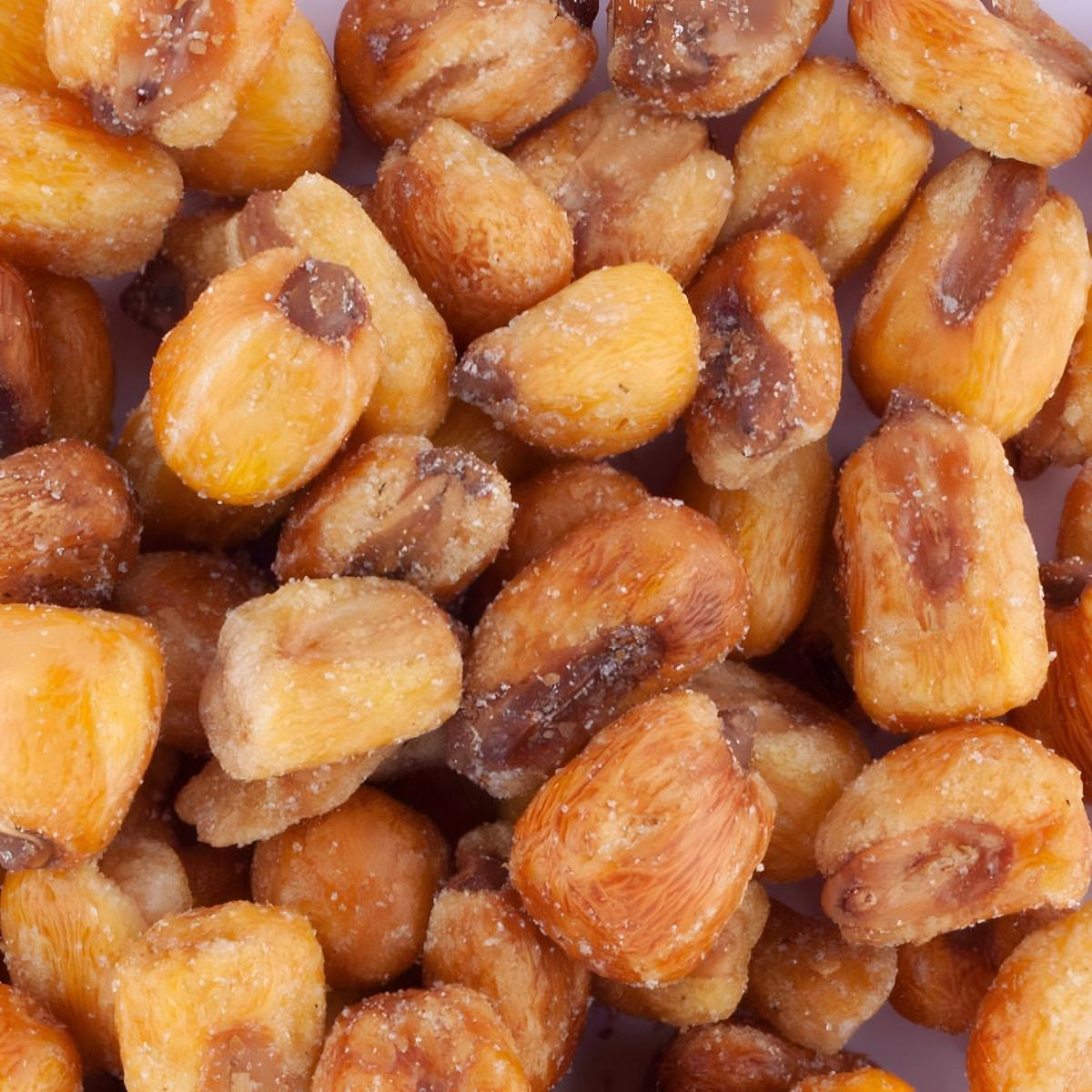Gros plan sur les grains de maïs grillés salés PROFRUIT, texture dorée et croustillante idéale pour les en-cas sains et savoureux.