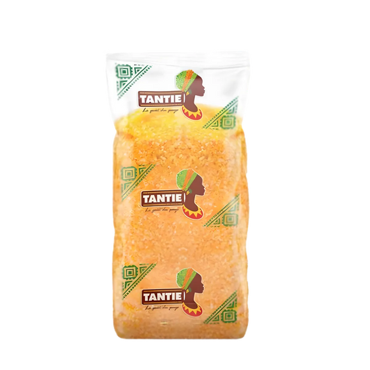Maïs Haïti broyé TANTIE en sachet transparent, ingrédient polyvalent pour recettes sucrées ou salées, texture authentique d'épicerie salée.