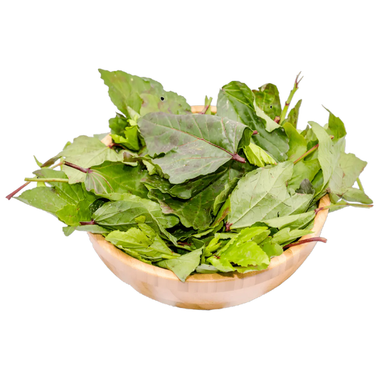 Feuilles de Bissap Bio - N'gai N'gai dans un bol en bois, plante fraîche au goût acidulé, parfaite pour plats exotiques et boissons santé.