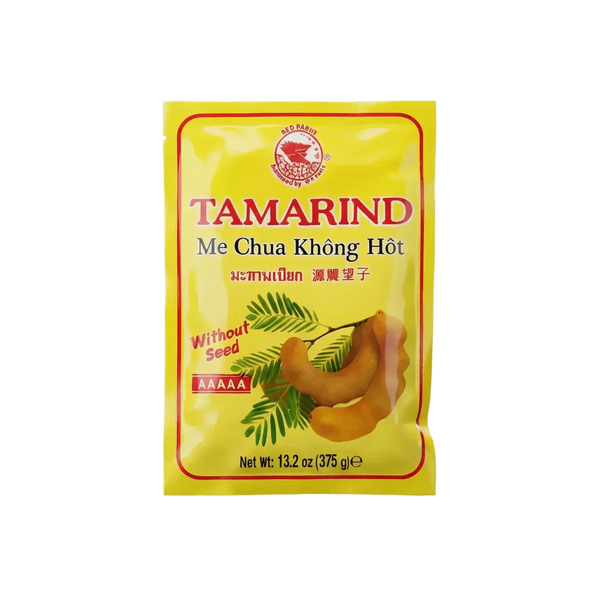 Aperçu d'un sachet de pâte de tamarin RED RABIIT, sans noyaux, 375g, sur fond jaune.