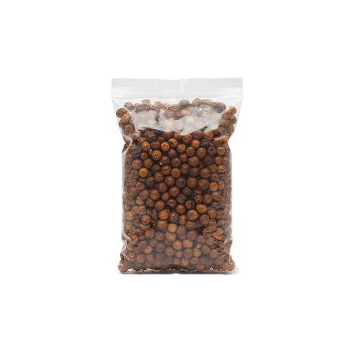 Épice gnangnan en grain dans un sachet transparent sans étiquette, idéale pour la cuisine africaine et les recettes épicées - ÉPICERIE SALÉE - NKOSI.