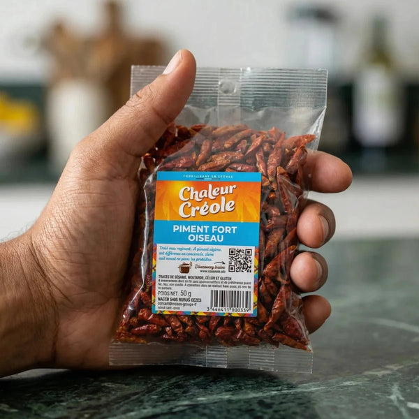 Piment fort oiseau vendu par lot de Chaleur Créole, présenté dans un sachet transparent.
