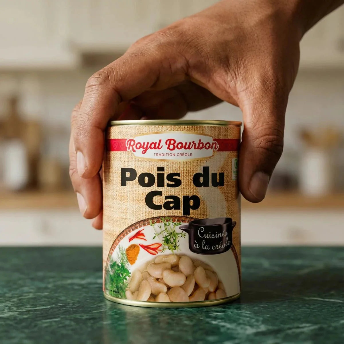 Conserve di piselli del Capo alla creola di Royal Bourbon con una consistenza di tela di juta.