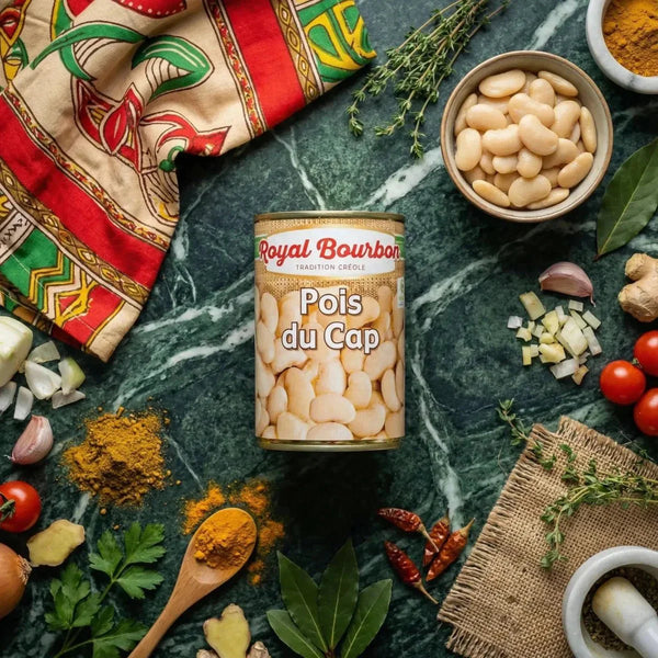 Royal Bourbon Cape Peas, 400g. Culinary staging on a marbled green background with ingredients.