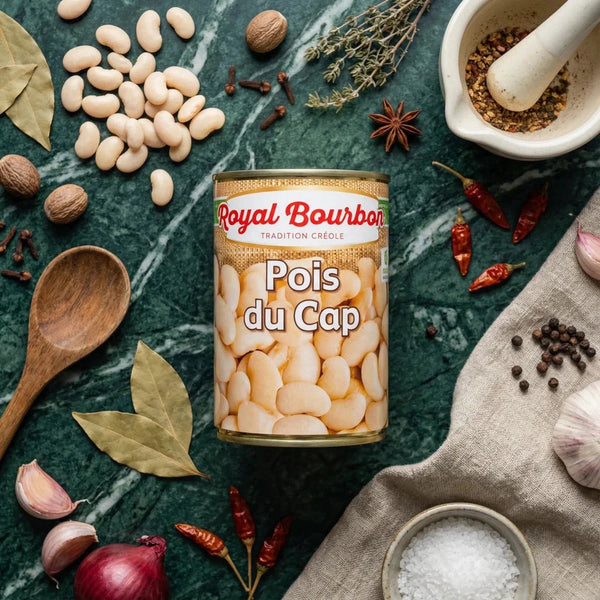 Canned Royal Bourbon white beans, surrounded by nutmeg and spices.
