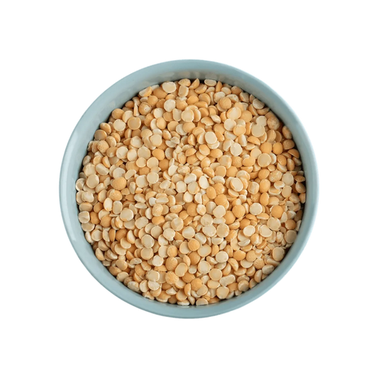 Bol rempli de Pois du Val LEGUMOR décortiqués, riches en nutriments, parfaits pour l'épicerie salée et les préparations culinaires saines.