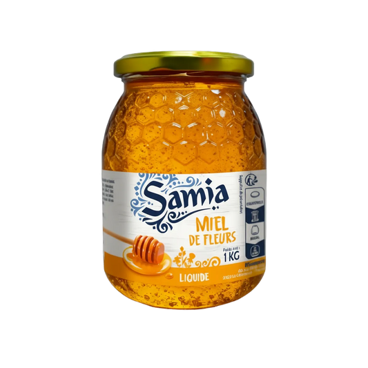 Pot de 1kg de miel de fleur SAMIA au design alvéolé, miel naturel à texture fluide, parfait pour l'épicerie sucrée et la cuisine.