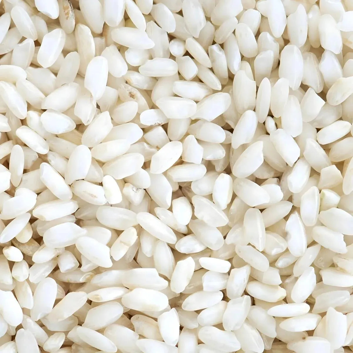 Gros plan sur les grains de riz gluant PHOENIX, montrant leur texture blanche et collante idéale pour les plats asiatiques authentiques.