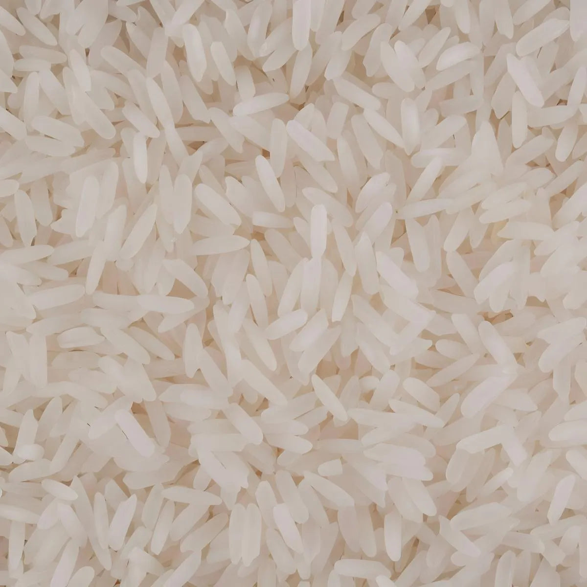 Gros plan sur le Riz Thai Parfumé LOTUS à grain long, texture légère idéale pour plats asiatiques et recettes en sauce.