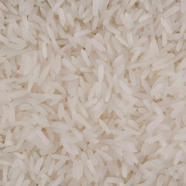 Riz thaï parfumé blanc de LOTUS, présentant une texture granuleuse dense.
