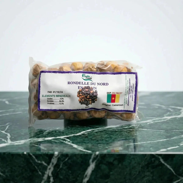 Sac de Rondelle du Nord en grain Saubo Foods sur une table verte. Fabrication 01/10/24.