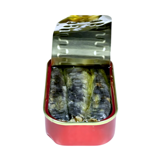 Boîte ouverte de sardines à l'huile ANNY montrant des sardines entières en conserve, parfaites pour salades et recettes savoureuses.