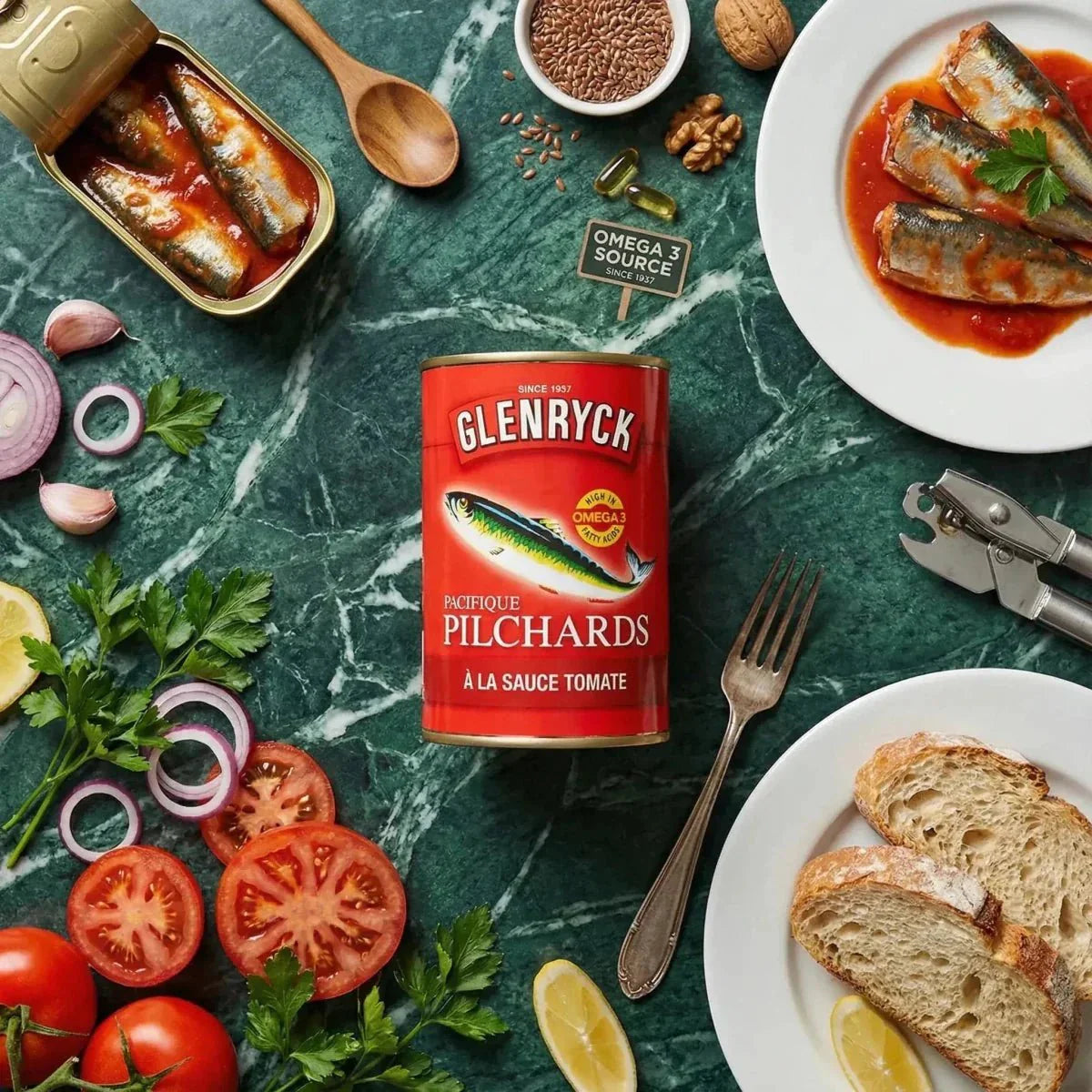 GLENRYCK Pilchard Sardines in tomato sauce displayed on a table with tomatoes.