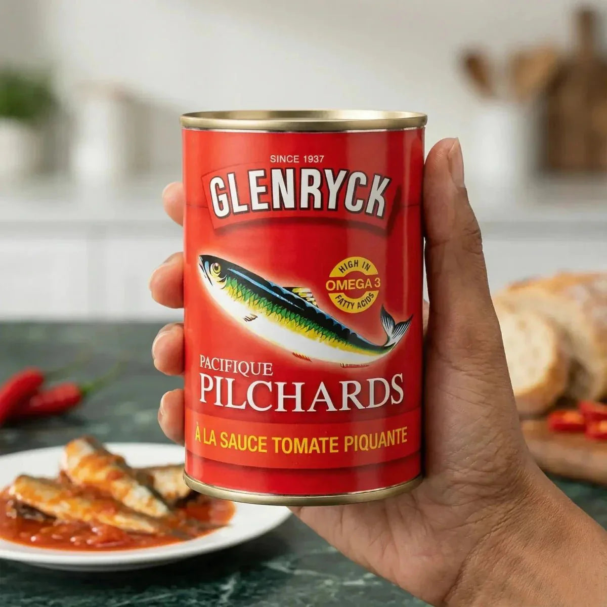 GLENRYCK Pilchard Sardines in Spicy Tomato Sauce, displayed in a kitchen.