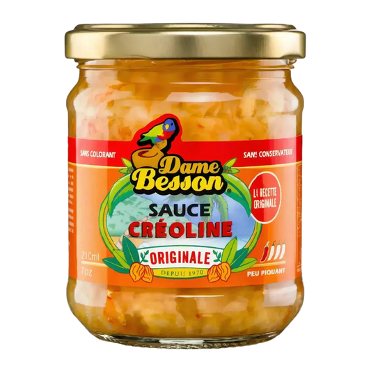 Bocal de sauce créoline DAME BESSON. Sauce créole en pot, avec logo coloré, sur fond noir.