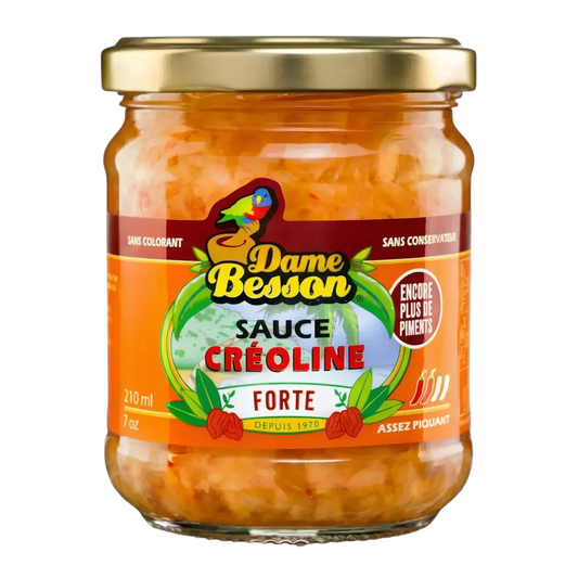 Bocal de sauce créoline forte Dame Besson sur fond noir. Étiquette orange et verte.