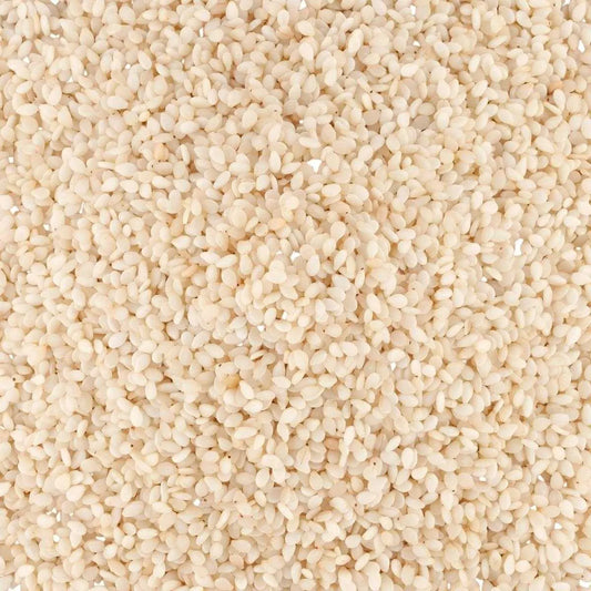 Gros plan sur graines de sésame blanc SAMIA, texture croquante et saveur douce, parfaites pour cuisine saine et équilibrée.
