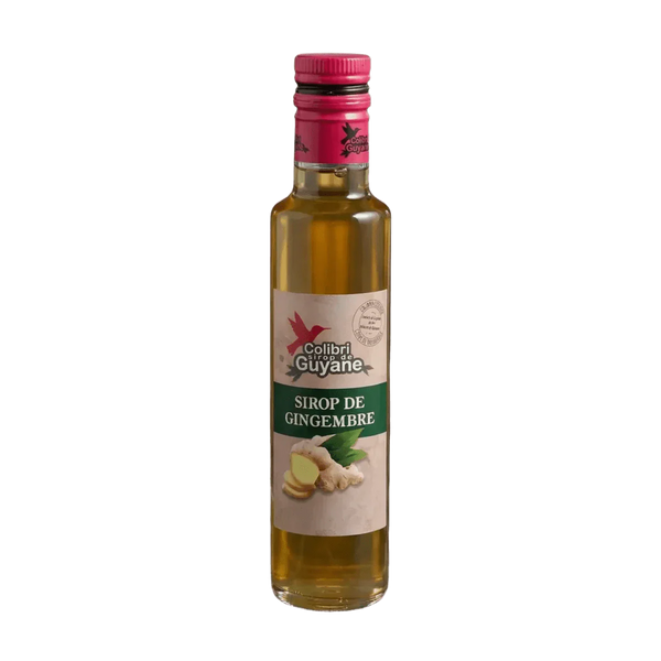 Sirop de gingembre, DELICES DE GUYANE, en bouteille de verre transparente avec une étiquette verte.