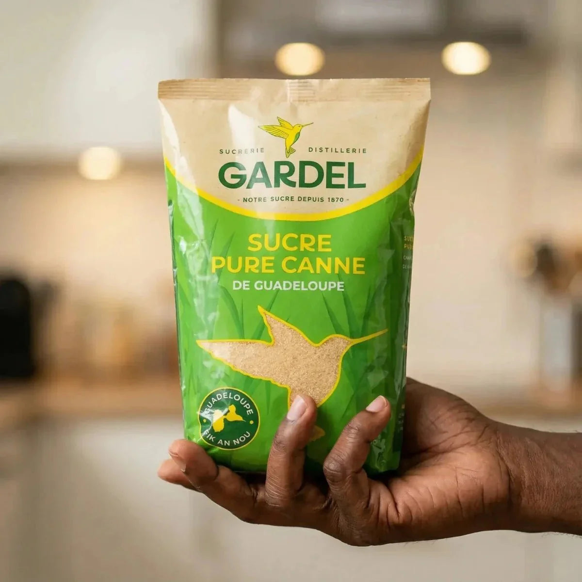 Zucchero di canna puro Gardel, presentato in una confezione verde.