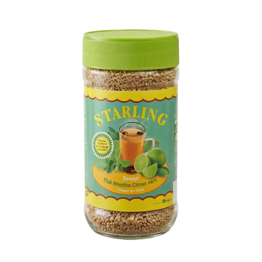 Instant muntthee met limoen van STARLING, in een doorzichtige pot met groene deksel.