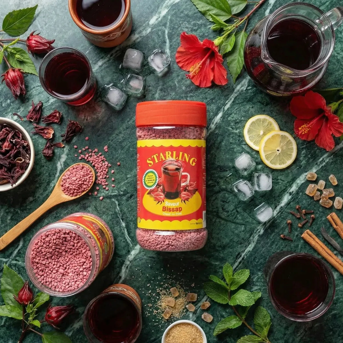 STARLING hibiscus tea (400g) in a gourmet setting. Accompaniments: hibiscus flowers, spices.