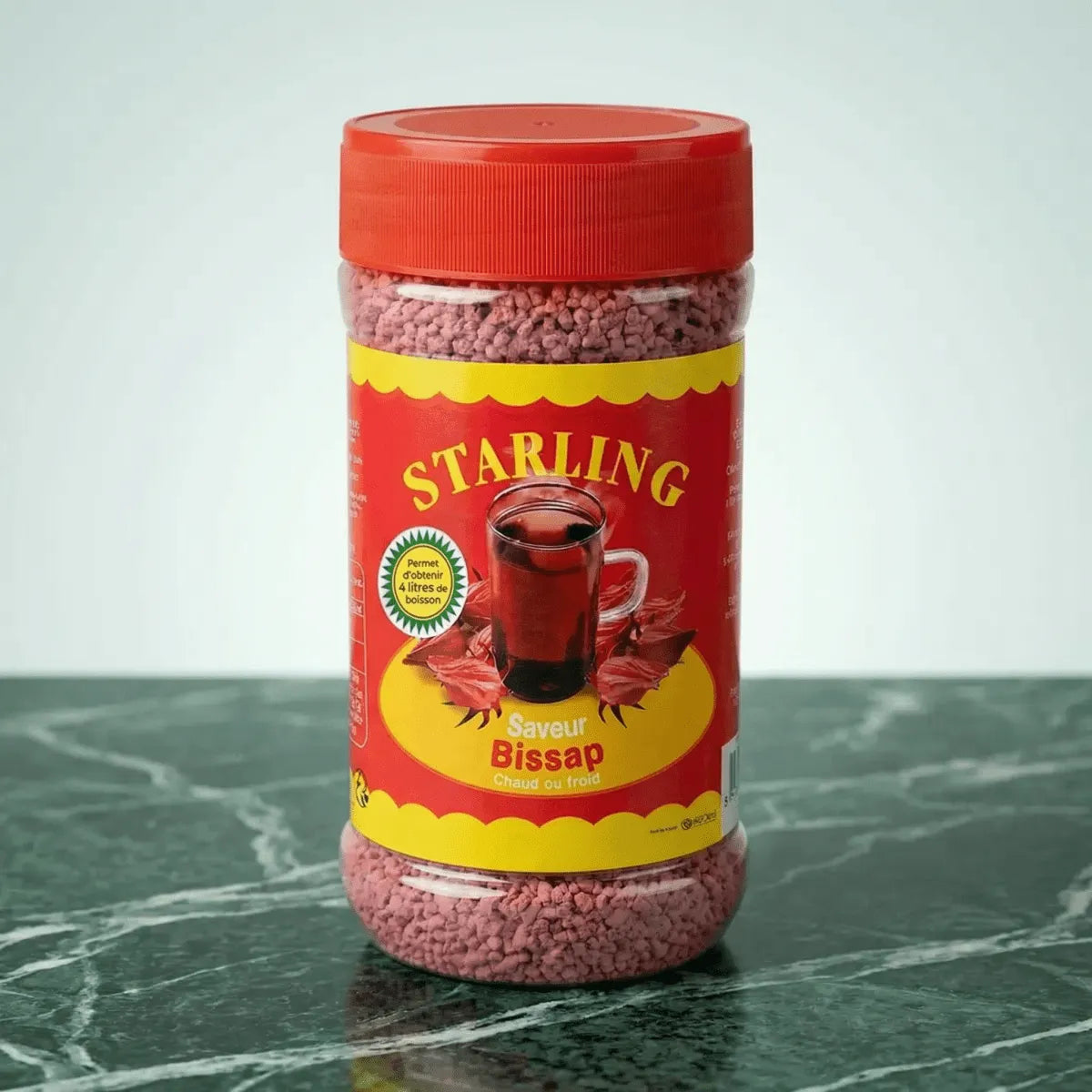 Starling flavored bissap tea, presented in a transparent plastic jar with a lid.