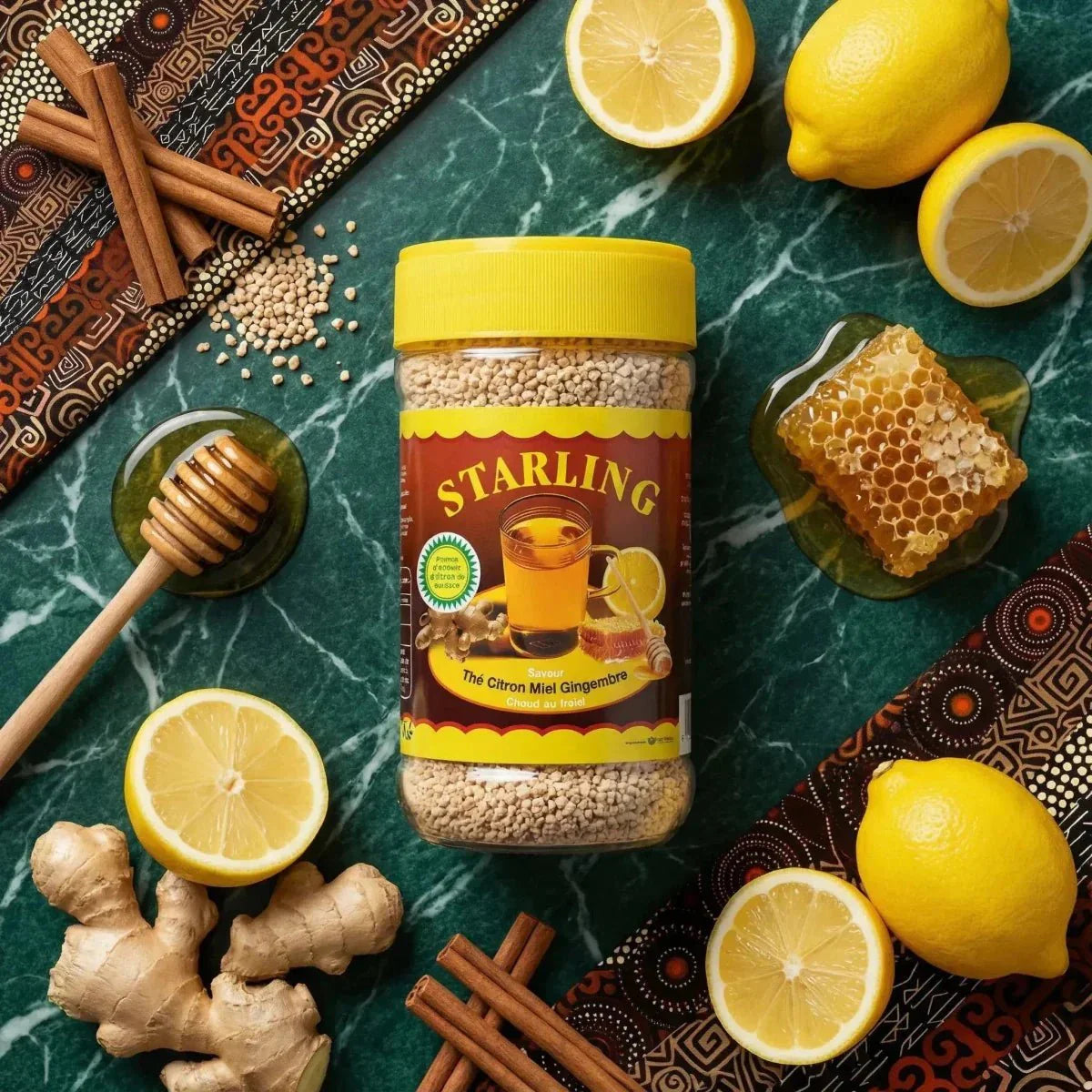 Instant thee honing citroen gember van STARLING, omringd door citroenen, gember en honing.