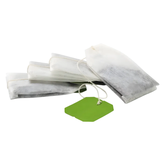 Sachets individuels de thé noir à la vanille BIO RACINES, infusables, avec étiquette verte, pour une dégustation pratique et aromatique.