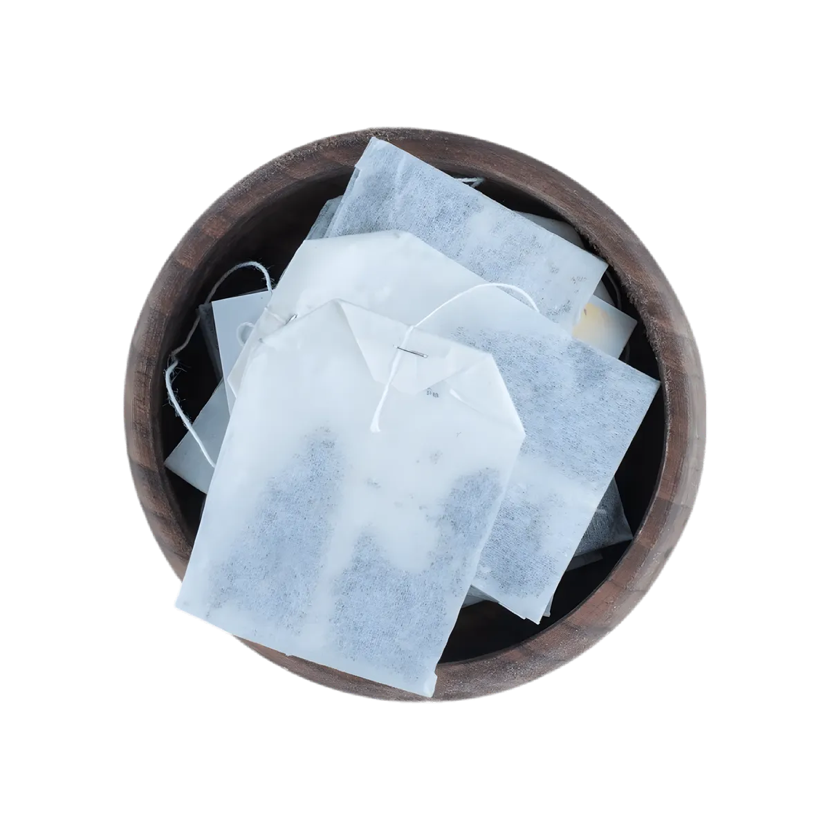 Sachets individuels de Tisane Brûle-graisses DR ERNST'S dans un bol en bois, infusion minceur pour bien-être quotidien.