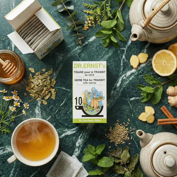 Tisane Transit DR ERNST'S avec théière, tasse de thé, miel, citron.