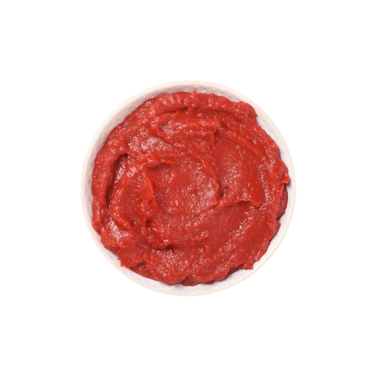 Bol de tomate concentrée DE RICA à la texture épaisse et couleur intense, parfait pour enrichir vos recettes salées maison.