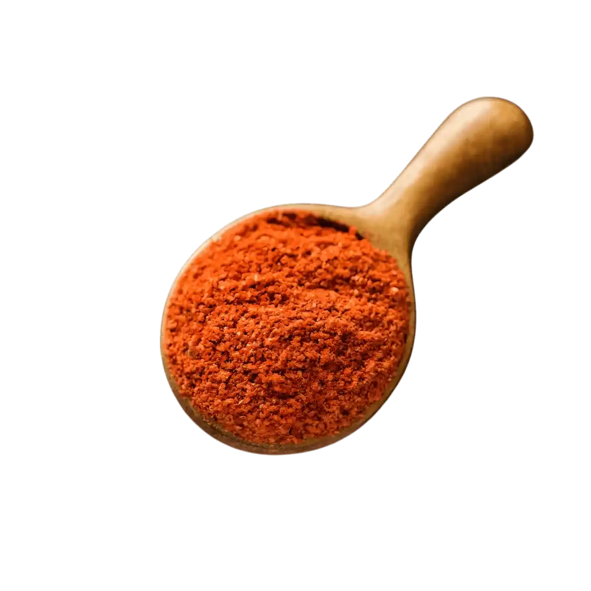 Cuillère en bois remplie de poudre d'assaisonnement Tout en 1 Tomate JUMBO, mélange riche en tomate et épices naturelles.