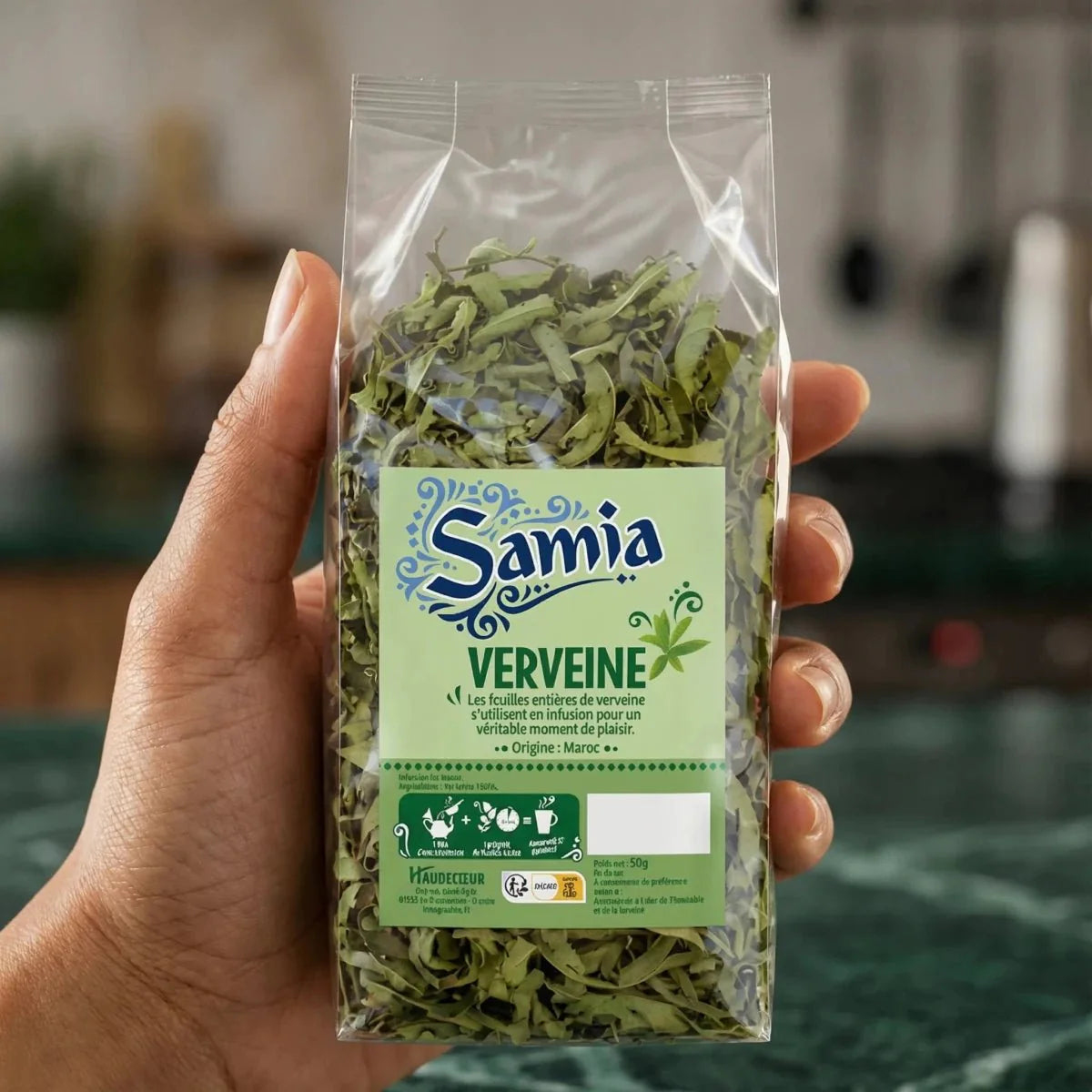 Gedroogde citroenverbena bladeren van Samia, gepresenteerd in een doorzichtig zakje.