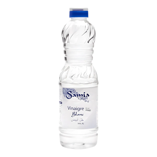 Bouteille de vinaigre blanc halal SAMIA, condiment essentiel pour la cuisine, idéale pour assaisonner salades et plats cuisinés.