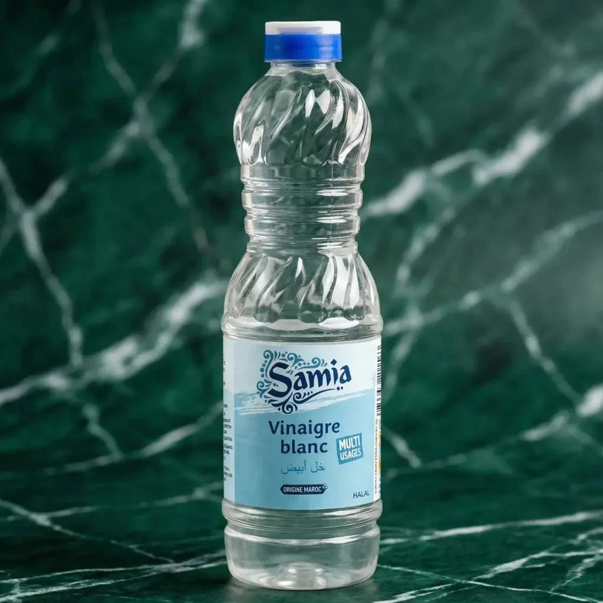 Bottiglia di Aceto bianco halal SAMIA, 500mL, su sfondo verde marmorizzato.